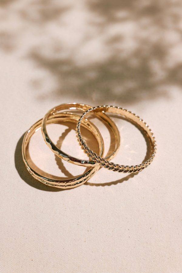 Twisted Elegance Textured Gold Bangle Stack Supply - Image 3